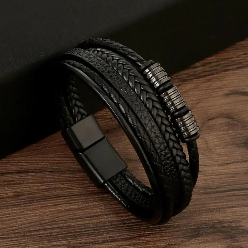 Pulseira Masculina de Couro Trançado – Estilo Punk com Cruz Preta Decorativa e Fecho Magnético