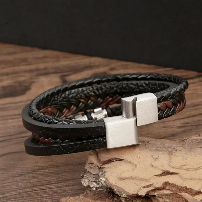 Pulseira Masculina de Couro Trançado – Estilo Punk com Cruz Preta Decorativa e Fecho Magnético