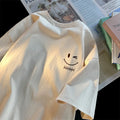 Camiseta Unissex com estampa de rosto sorridente